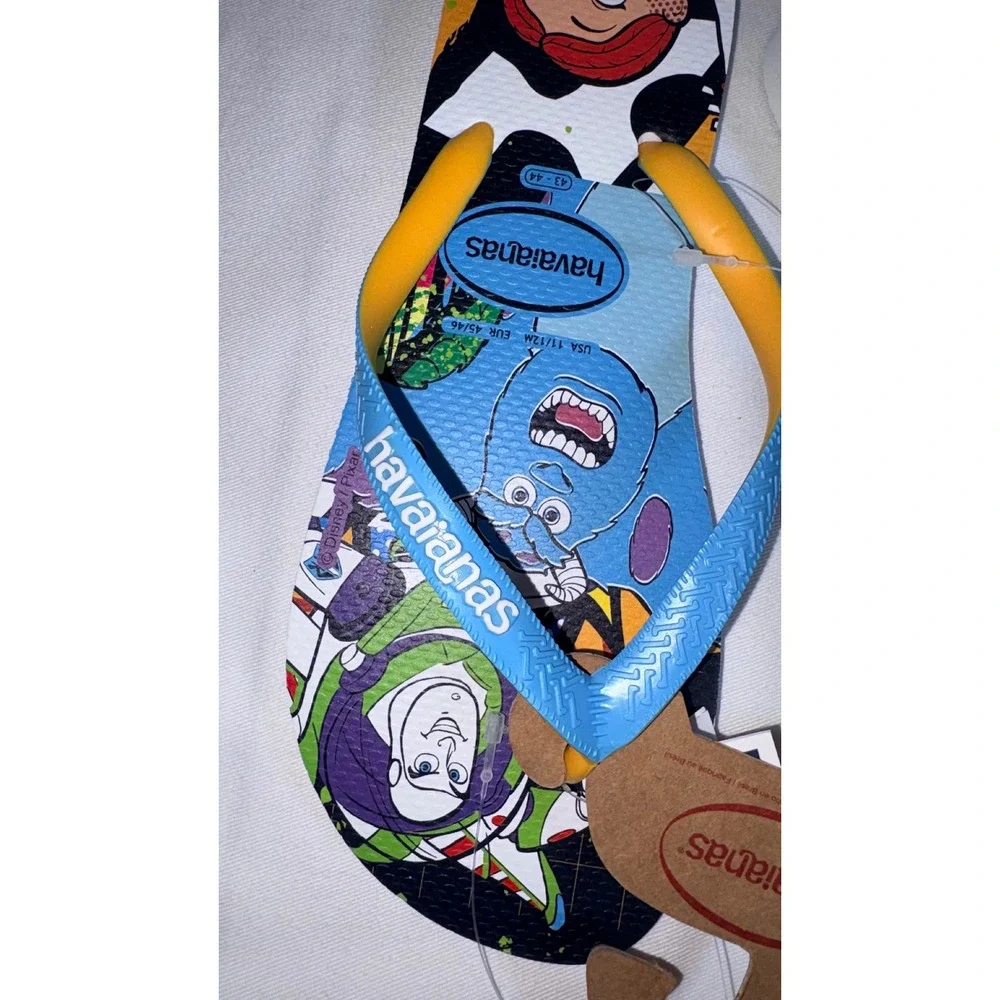 Havaianas Disney Pixar Flip Flops Size 11/12 White/Blue NEW Woody Buzz Sulley